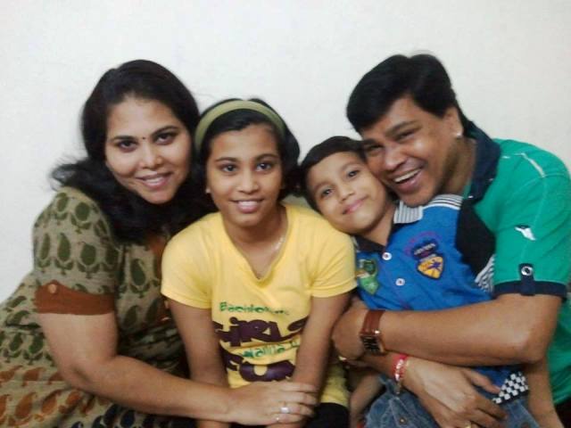 Digambar Naik With His Family