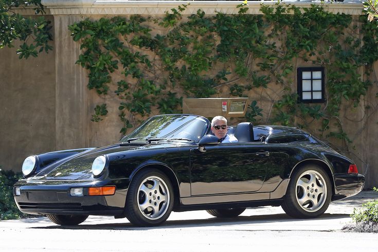 George Clooney With His Car