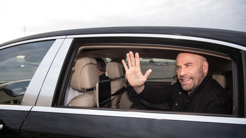 John Travolta With His Car