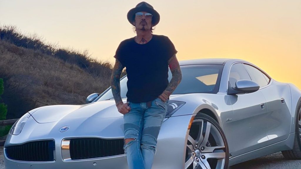 Tommy Lee With His Car